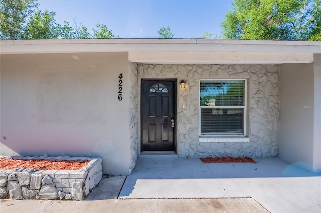 4226 Kelly Miller Ct, Orlando, FL 32811 - entrance to property with stucco siding