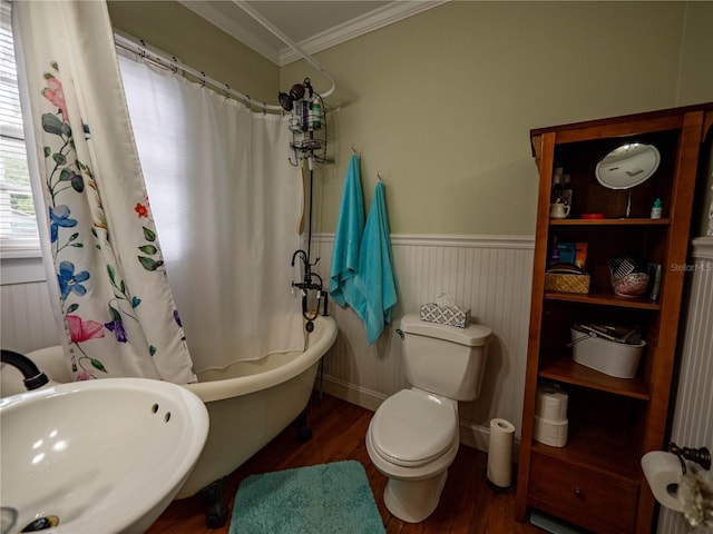 1102 S Oak Ave, Sanford, FL 32771 - full bathroom featuring wood finished floors, ornamental molding, toilet, a wainscoted wall, and a sink