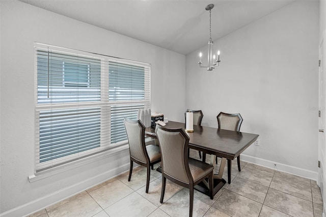 503 Meadow Pointe Dr, Haines City, FL 33844 - dining room featuring baseboards, a chandelier, and light tile patterned flooring