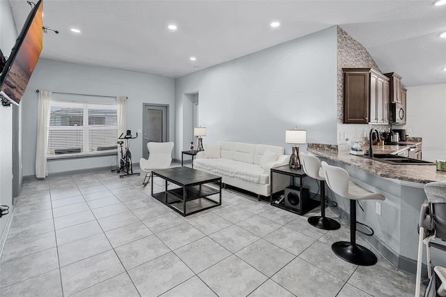503 Meadow Pointe Dr, Haines City, FL 33844 - living room with light tile patterned flooring and recessed lighting