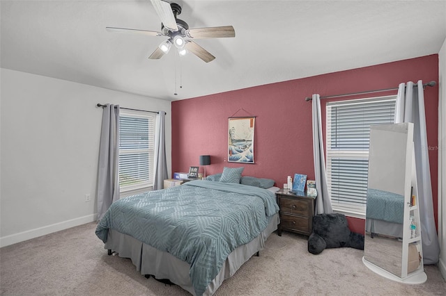 503 Meadow Pointe Dr, Haines City, FL 33844 - bedroom with carpet floors, a ceiling fan, and baseboards