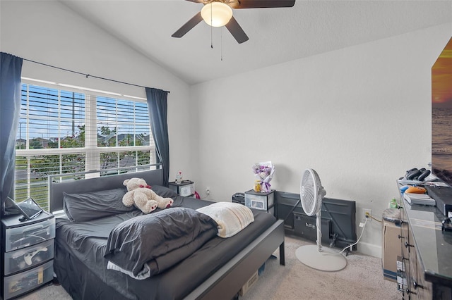 503 Meadow Pointe Dr, Haines City, FL 33844 - carpeted bedroom with lofted ceiling, a ceiling fan, and baseboards
