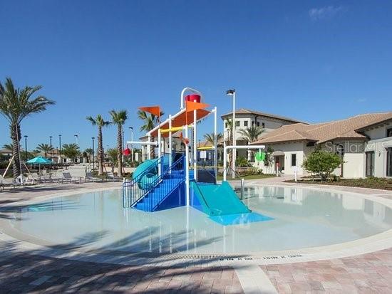 1513 Maidstone Ct, Davenport, FL 33896 - community playground featuring a water play area and a community pool