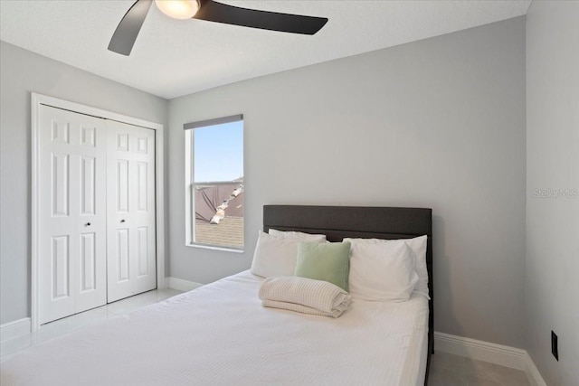 166 Minniehaha Cir, Haines City, FL 33844 - bedroom with a closet, baseboards, and ceiling fan