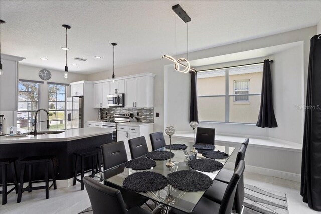 166 Minniehaha Cir, Haines City, FL 33844 - dining area featuring recessed lighting