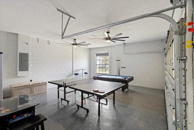 166 Minniehaha Cir, Haines City, FL 33844 - playroom with concrete block wall, electric panel, a textured ceiling, ceiling fan, and billiards table