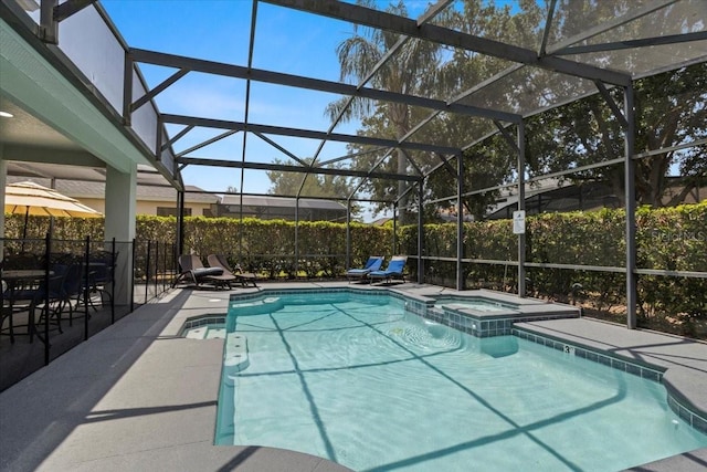 166 Minniehaha Cir, Haines City, FL 33844 - view of pool featuring a patio area, a pool with connected hot tub, and a lanai