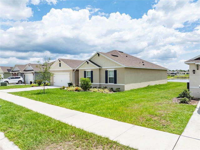view of front of house with stucco siding, driveway, a garage, a front lawn, and a residential view