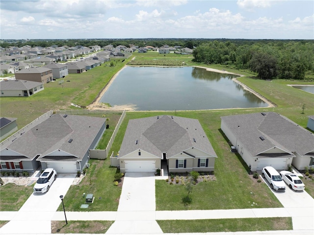 aerial view of residential area with a nearby body of water