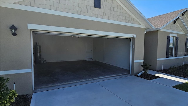 garage with driveway