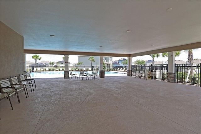 view of patio / terrace featuring a community pool