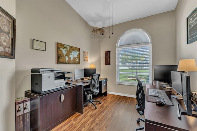 office with wood finished floors and baseboards