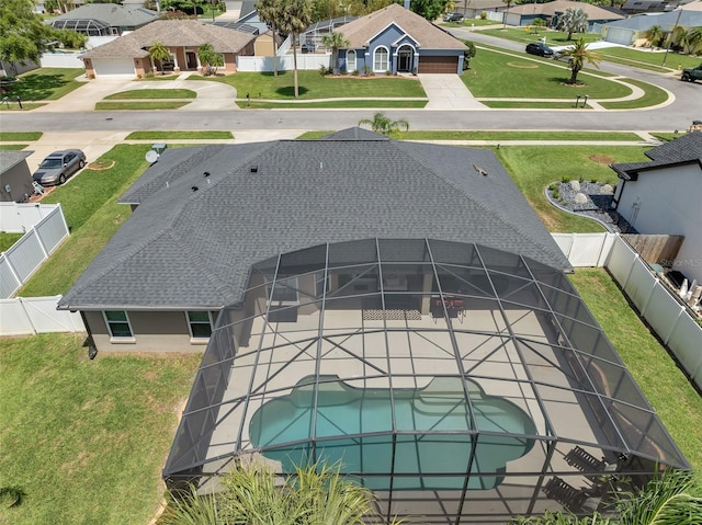 aerial perspective of suburban area with a pool area