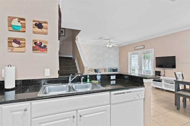 2952 Lucayan Harbour Cir Unit 105, Kissimmee, FL 34746 - kitchen with dishwasher, open floor plan, a sink, and white cabinetry