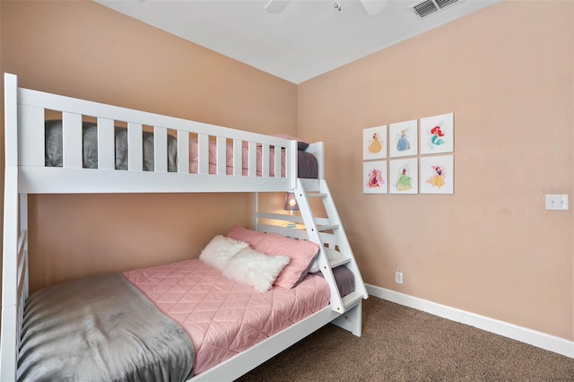 2952 Lucayan Harbour Cir Unit 105, Kissimmee, FL 34746 - bedroom with carpet, baseboards, and a ceiling fan
