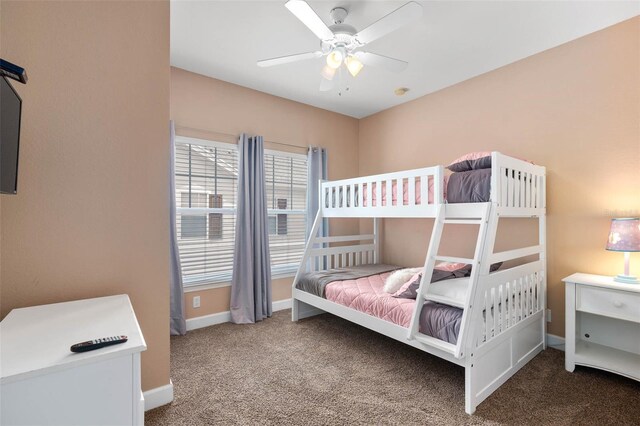 2952 Lucayan Harbour Cir Unit 105, Kissimmee, FL 34746 - bedroom with carpet floors, baseboards, and ceiling fan