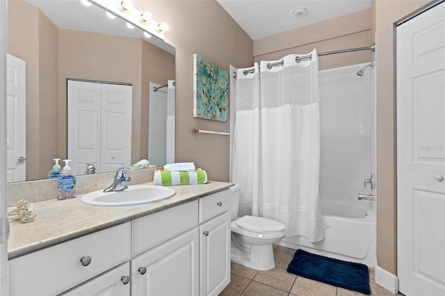 2952 Lucayan Harbour Cir Unit 105, Kissimmee, FL 34746 - full bathroom featuring tile patterned flooring, toilet, vanity, and shower / bath combo
