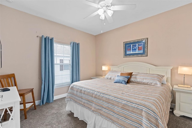 2952 Lucayan Harbour Cir Unit 105, Kissimmee, FL 34746 - bedroom with carpet flooring, baseboards, and a ceiling fan