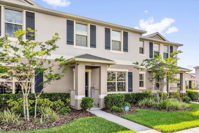 1555 Dawnview Way, Kissimmee, FL 34744 - view of property featuring stucco siding