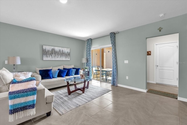 1555 Dawnview Way, Kissimmee, FL 34744 - tiled living area featuring baseboards