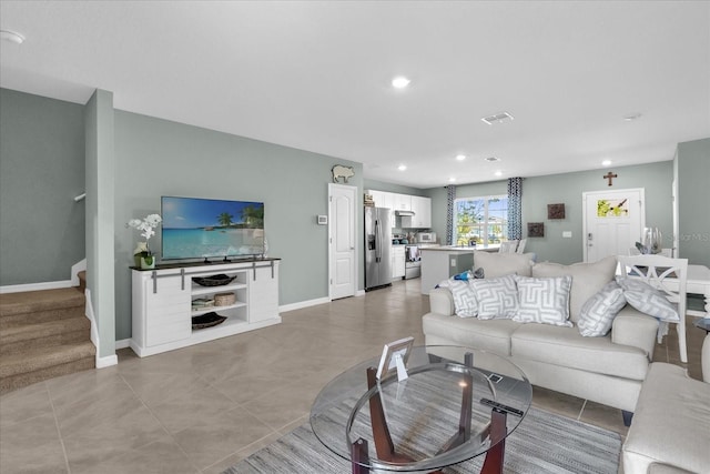 1555 Dawnview Way, Kissimmee, FL 34744 - living area with stairs, baseboards, recessed lighting, and light tile patterned floors