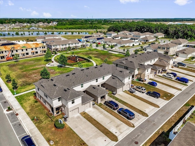 1555 Dawnview Way, Kissimmee, FL 34744 - aerial perspective of suburban area with a large body of water