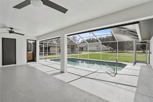 1438 Mclin Dr, Plant City, FL 33565 - swimming pool with a ceiling fan, a lawn, a patio, and a lanai