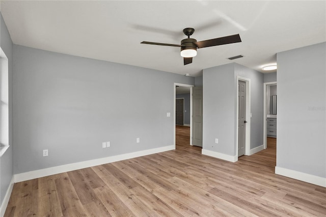 1438 Mclin Dr, Plant City, FL 33565 - spare room with ceiling fan, baseboards, and light wood-style flooring