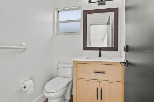 1438 Mclin Dr, Plant City, FL 33565 - bathroom featuring toilet, vanity, and baseboards