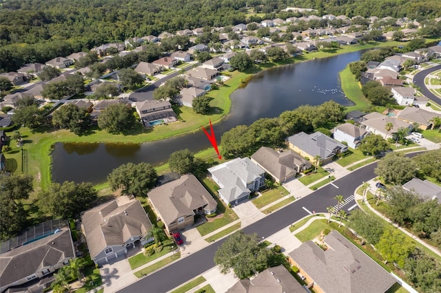 7263 Winding Lake Cir, Oviedo, FL 32765 - aerial overview of property's location featuring nearby suburban area, a large body of water, and a forest