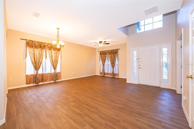 7263 Winding Lake Cir, Oviedo, FL 32765 - entryway featuring a chandelier, wood finished floors, baseboards, and a ceiling fan