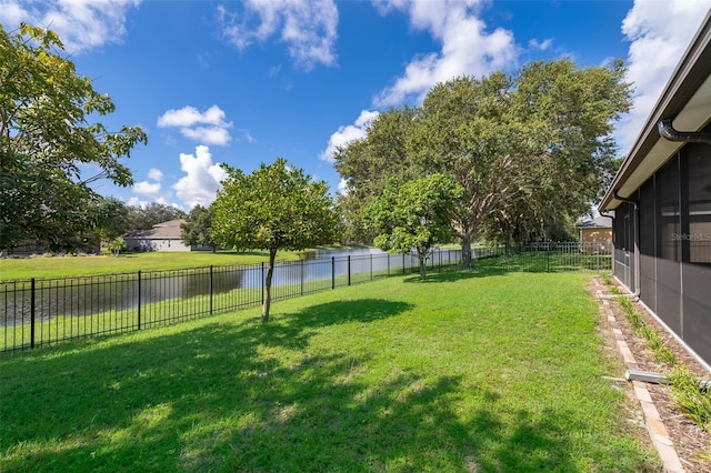 7263 Winding Lake Cir, Oviedo, FL 32765 - view of yard featuring a water view and a sunroom