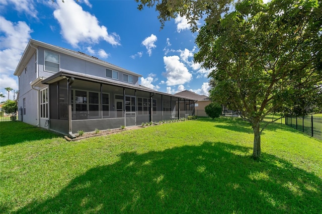 7263 Winding Lake Cir, Oviedo, FL 32765 - rear view of property with a sunroom and stucco siding