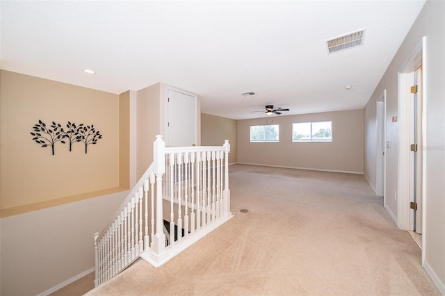 7263 Winding Lake Cir, Oviedo, FL 32765 - corridor featuring an upstairs landing, light carpet, baseboards, and recessed lighting