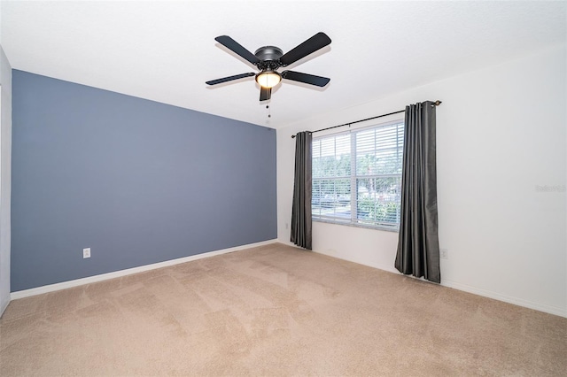 7263 Winding Lake Cir, Oviedo, FL 32765 - carpeted empty room with ceiling fan and baseboards