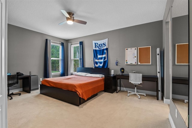3865 W Stillwood Ln, Lake Mary, FL 32746 - carpeted bedroom with baseboards, ceiling fan, and a textured ceiling