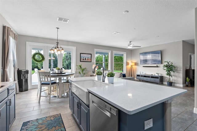 3865 W Stillwood Ln, Lake Mary, FL 32746 - kitchen featuring dishwasher, a sink, ceiling fan, open floor plan, and an island with sink