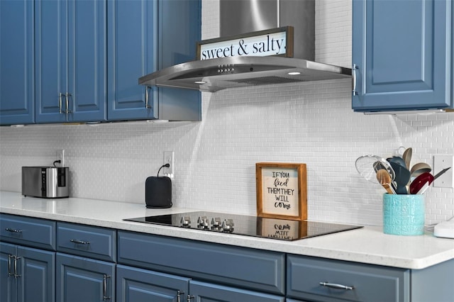 3865 W Stillwood Ln, Lake Mary, FL 32746 - kitchen with blue cabinets, wall chimney range hood, and tasteful backsplash