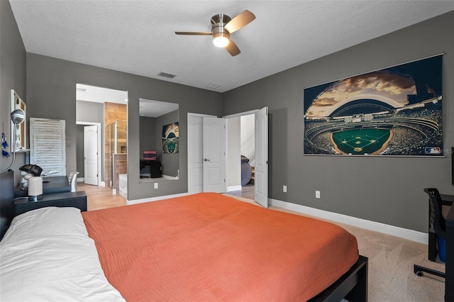 3865 W Stillwood Ln, Lake Mary, FL 32746 - bedroom featuring baseboards, a ceiling fan, and connected bathroom