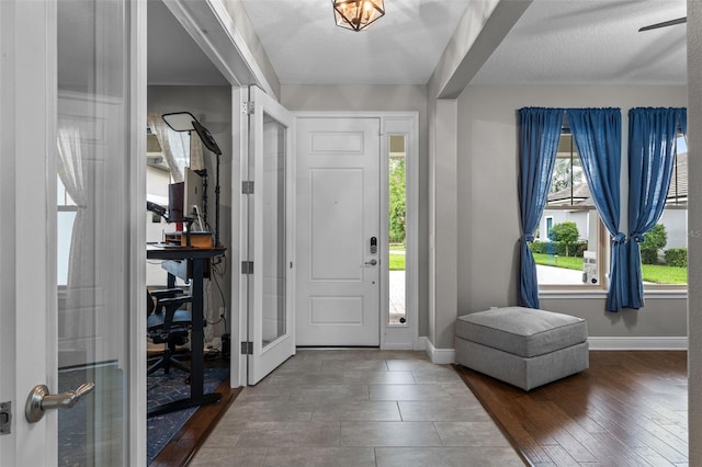 3865 W Stillwood Ln, Lake Mary, FL 32746 - entrance foyer with baseboards and wood finished floors
