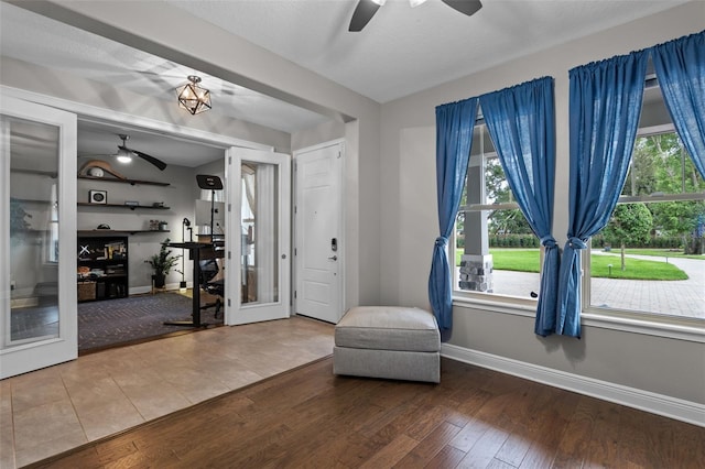 3865 W Stillwood Ln, Lake Mary, FL 32746 - sitting room featuring ceiling fan, baseboards, and wood finished floors