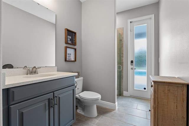 3865 W Stillwood Ln, Lake Mary, FL 32746 - bathroom with toilet, a shower stall, tile patterned flooring, and vanity