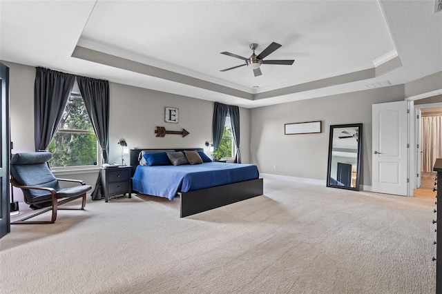 3865 W Stillwood Ln, Lake Mary, FL 32746 - bedroom with a tray ceiling, carpet floors, multiple windows, and ornamental molding