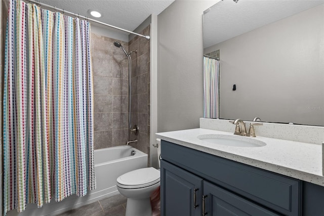 3865 W Stillwood Ln, Lake Mary, FL 32746 - bathroom with vanity, toilet, shower / bath combo with shower curtain, a textured ceiling, and tile patterned floors