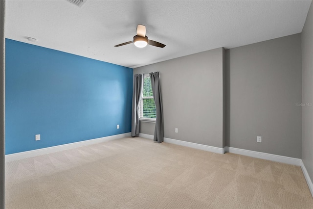 3865 W Stillwood Ln, Lake Mary, FL 32746 - empty room featuring a ceiling fan, carpet floors, baseboards, and a textured ceiling