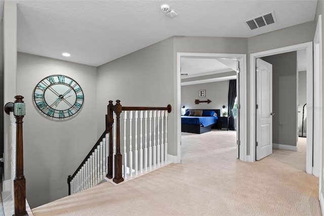 3865 W Stillwood Ln, Lake Mary, FL 32746 - hallway with an upstairs landing, carpet, baseboards, and recessed lighting