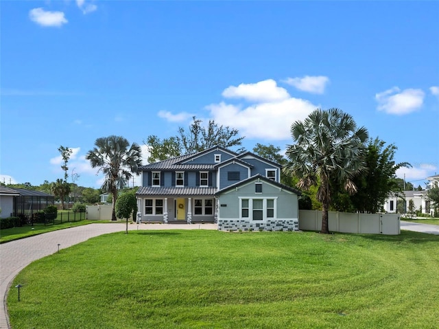 3865 W Stillwood Ln, Lake Mary, FL 32746 - view of front facade featuring driveway and a porch