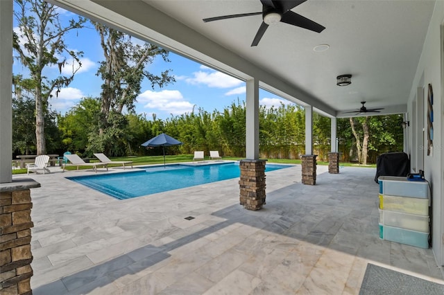 3865 W Stillwood Ln, Lake Mary, FL 32746 - swimming pool featuring ceiling fan, a patio, and view of scattered trees