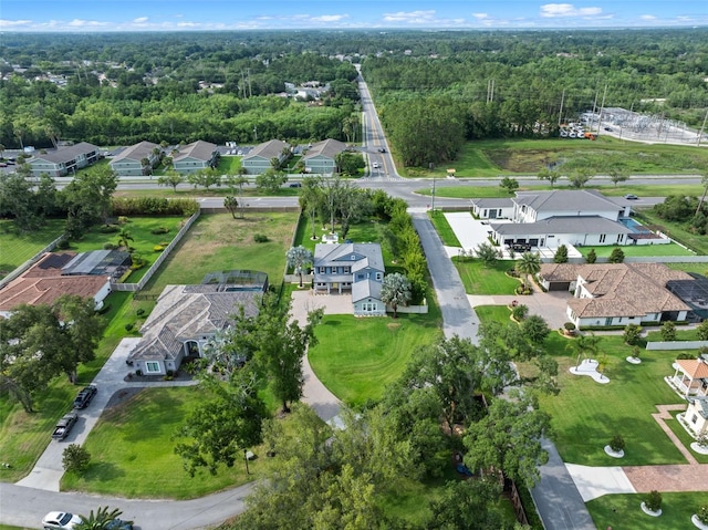3865 W Stillwood Ln, Lake Mary, FL 32746 - aerial view of property and surrounding area with nearby suburban area and a forest