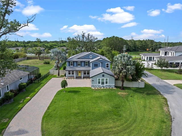 3865 W Stillwood Ln, Lake Mary, FL 32746 - view of front of house featuring driveway and a tile roof